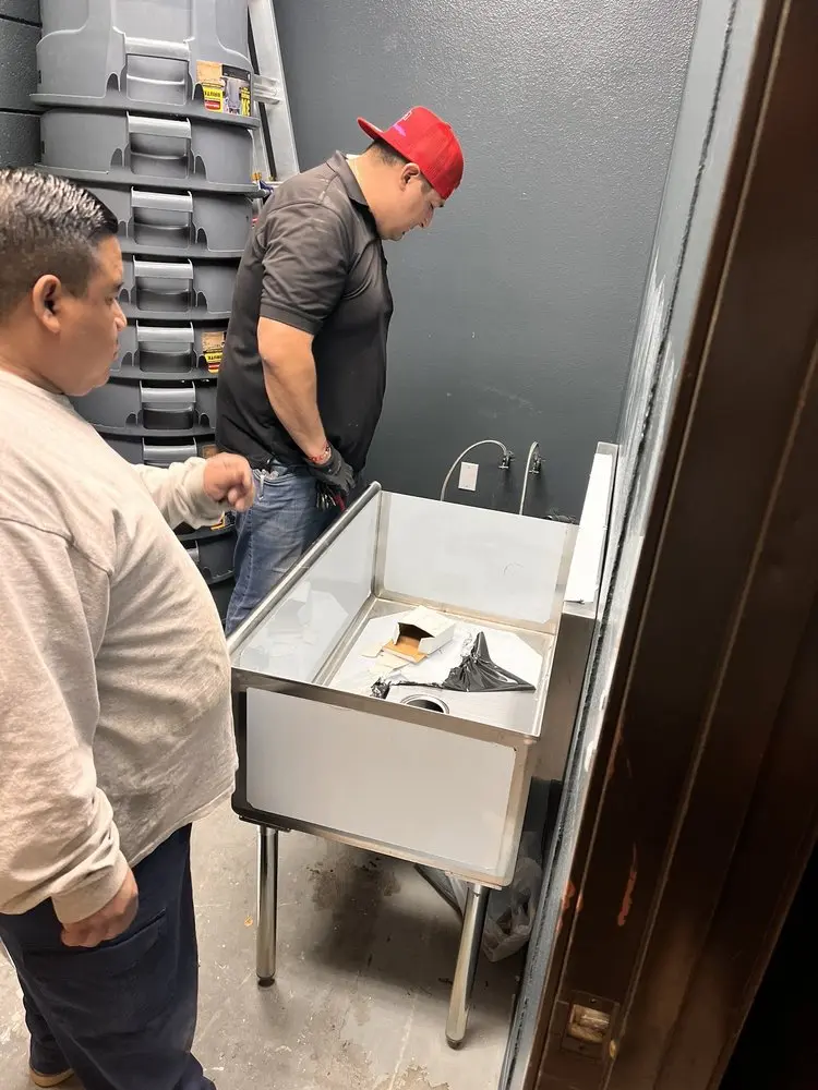 Commercial plumbing and sink installation in Huntington